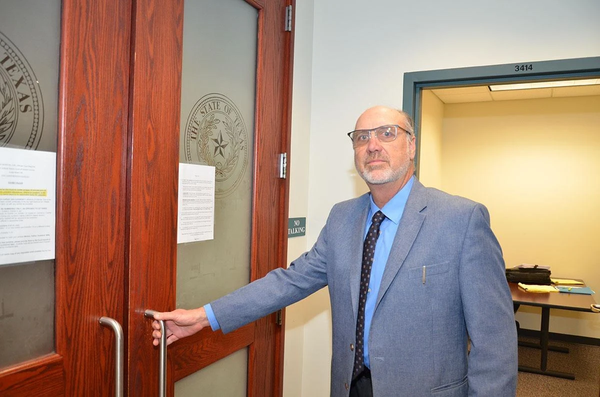 David Heiman entering the Courthroom